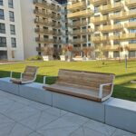 Banc avec accoudoirs sur muret Orthez
